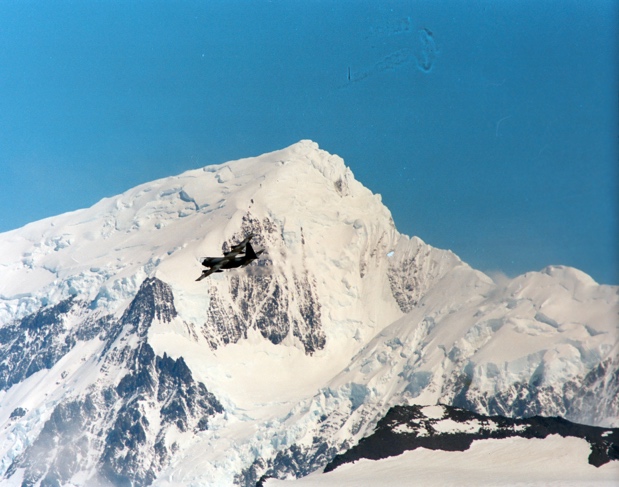Snow-covered mountain beneath a blue sky in South Georgia